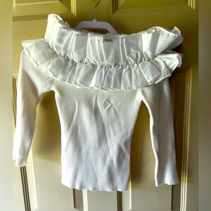 White off the shoulder ruffle neck. 3/4 sleeves. Never worn. NWT.